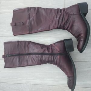 Brown Heeled Boots with Knee-High Design and Zipper Closure